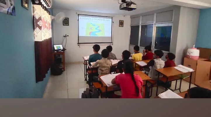 A full class of students in session at Ronak Coaching Center